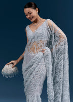 Ice Blue Heavy Embroidered Net Saree With Cutwork Border And All Over Floral Jaal