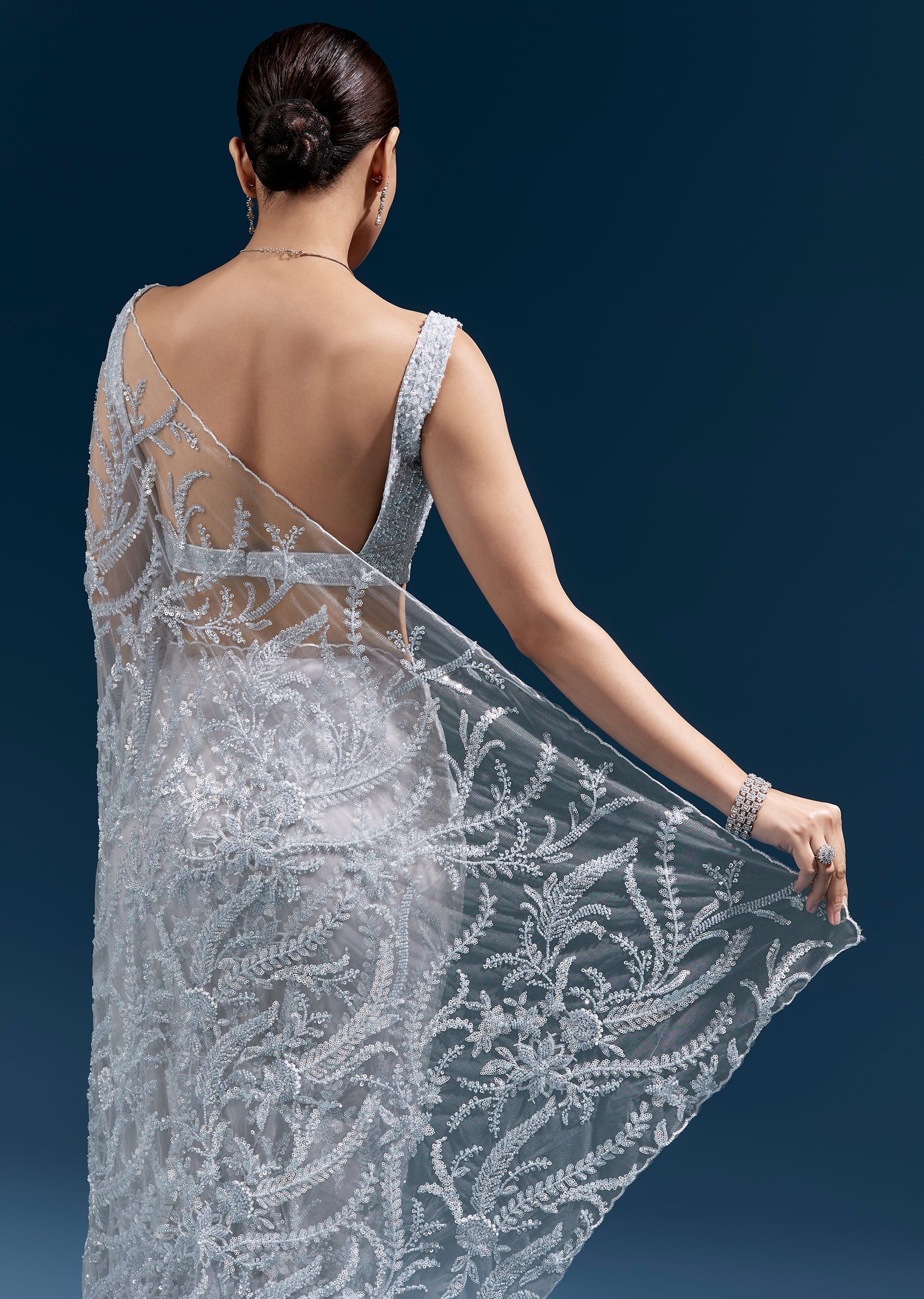 Ice Blue Heavy Embroidered Net Saree With Cutwork Border And All Over Floral Jaal