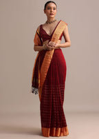 Maroon Linen Woven Saree With Zari Border And Unstitched Blouse