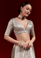 Metallic Silver Grey Banarasi Tissue Saree With Micro Geometric Weave And Floral Woven Border