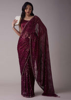 Wine Sequins Saree With An Embellished Border