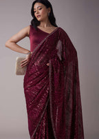 Wine Sequins Saree With An Embellished Border