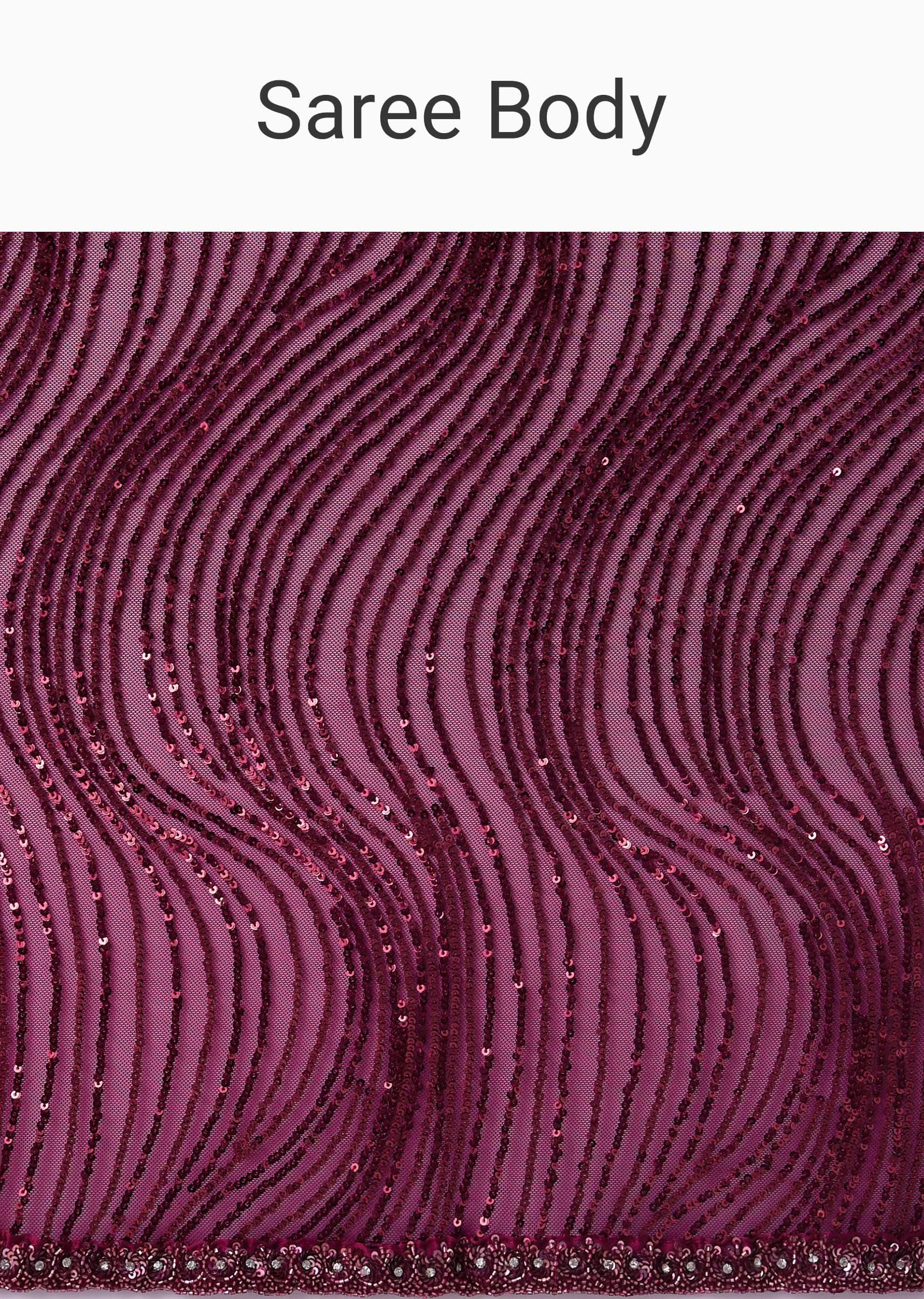 Wine Sequins Saree With An Embellished Border